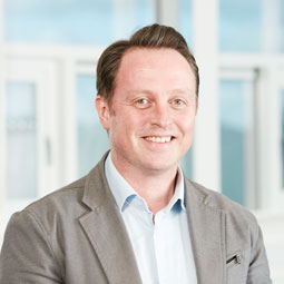 a man wearing a suit and tie