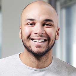 a man smiling for the camera