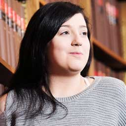 a woman looking at the camera