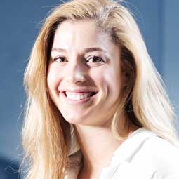 a woman smiling for the camera