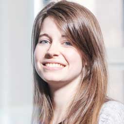 a woman smiling for the camera