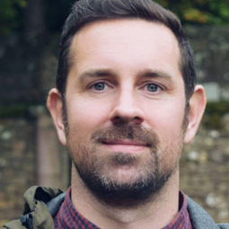 a man smiling for the camera