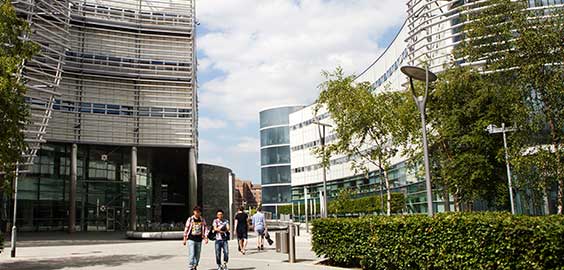 a group of people walking down a street