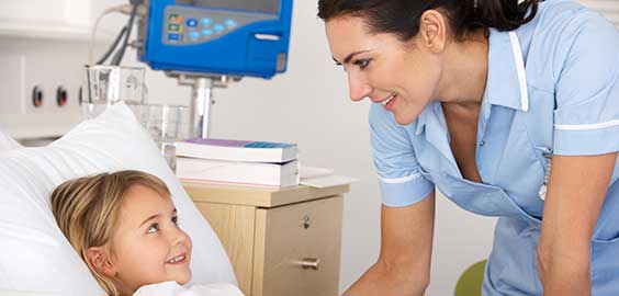 a young girl on a bed