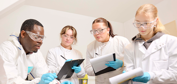 students writing lab results