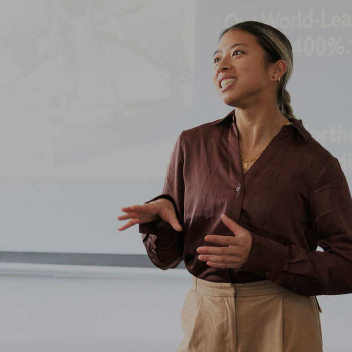 woman giving business presentation