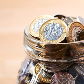 Pound Coins in a Glass Jar