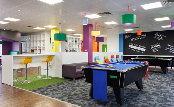 Trinity Square social space with seating area, pool table, table tennis and space for communal work.
