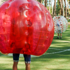 person in inflatable ball