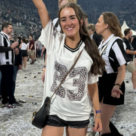 girl smiling at concert