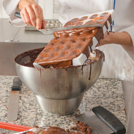 pouring chocolate into bowl