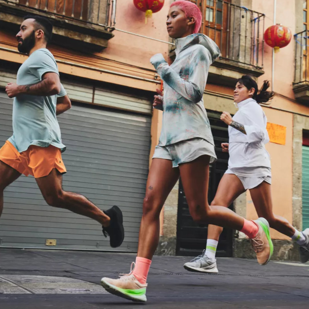 three people running