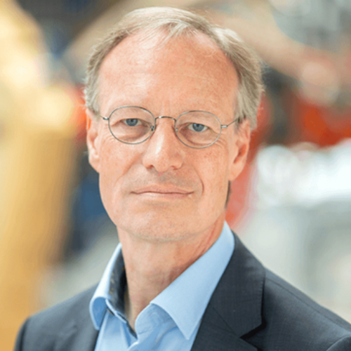 Photograph of man looking at the camera.