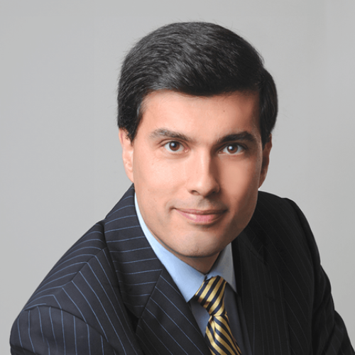 Photograph of man looking at the camera.