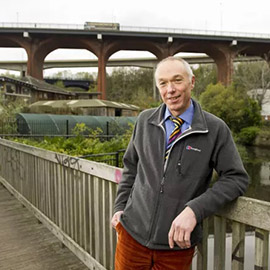 a man standing on a bridge