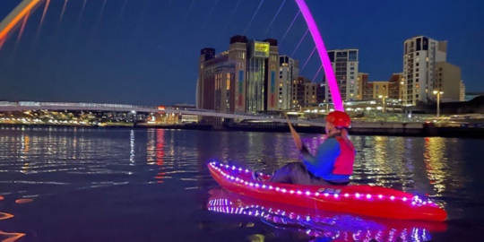 Late night glow-up canoeing on the River Tyne