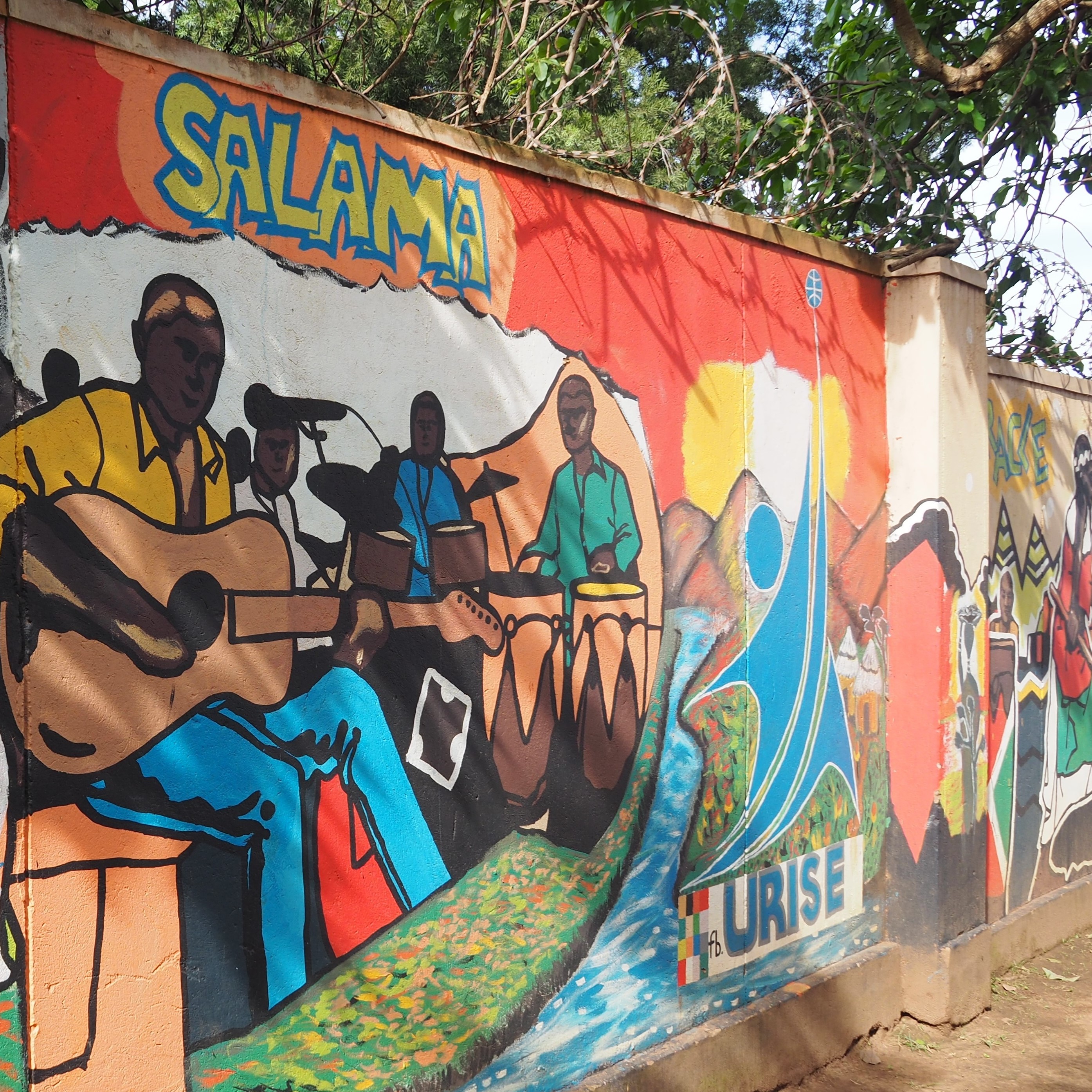 Art on the walls of the Antonio Guterres Urban Refugee Centre in Kampala.
