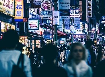 Image of crowded urban city scene at night