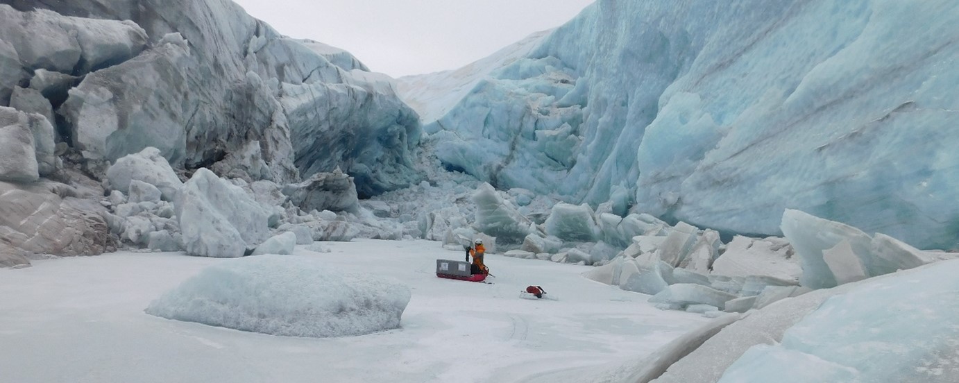 Scientist and sleigh in antartica
