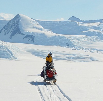 Man on sleigh in arctic