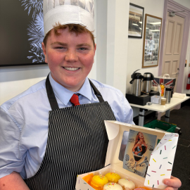 Student with cakes