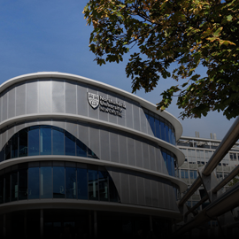 Northumbria's CIS building with a blue sky