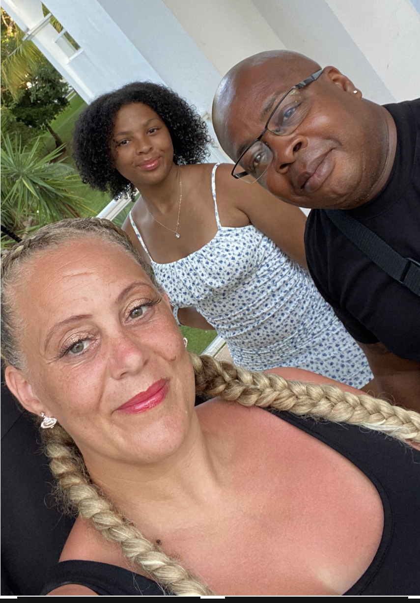 3 people taking a selfie, smiling at camera