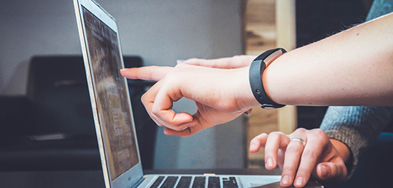 a person using a laptop computer
