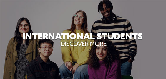 Two students smiling with text saying international students