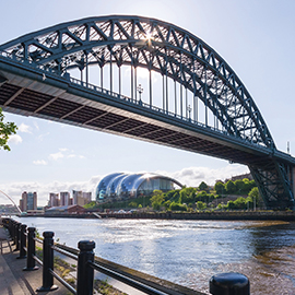 Picture of bridge stretching across the tyne river at quayside