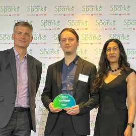 Arthur collecting his award with Richard Watts of Emap and Isabella Mascarenhas of RS Grass Roots
