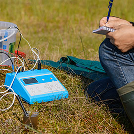 image of a person using Environmental Monitoring equipment 
